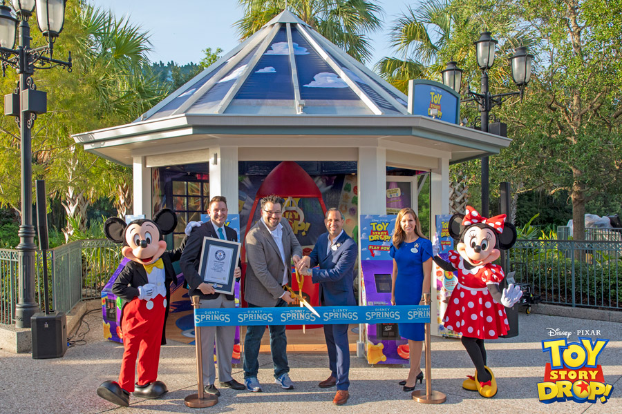 Ribbon cutting at the Toy Story Drop! pop-up experience at Disney Springs