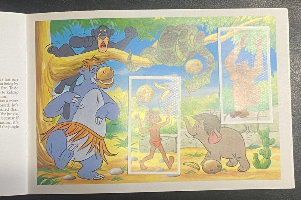 The Jungle Book cards and page from Magical World of Disney PG Tips Card Collection