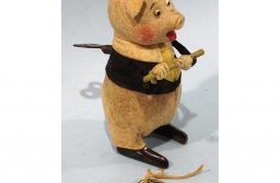 Schuco for Walt Disney Three Little Pigs Flute Player