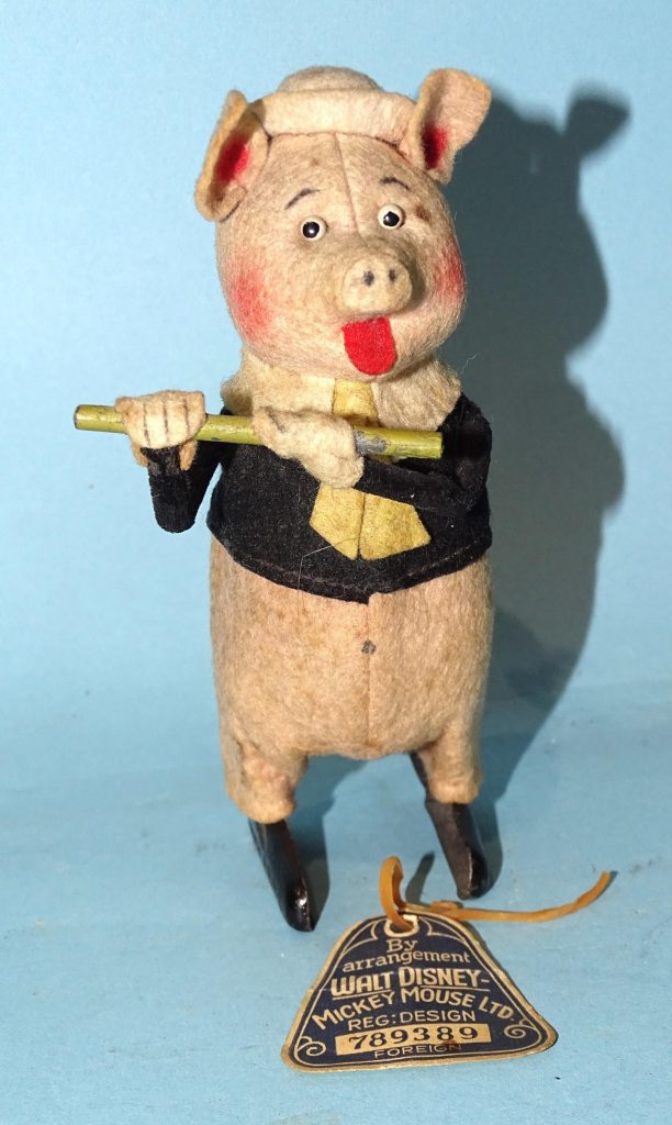 Schuco for Walt Disney Three Little Pigs Flute Player front view